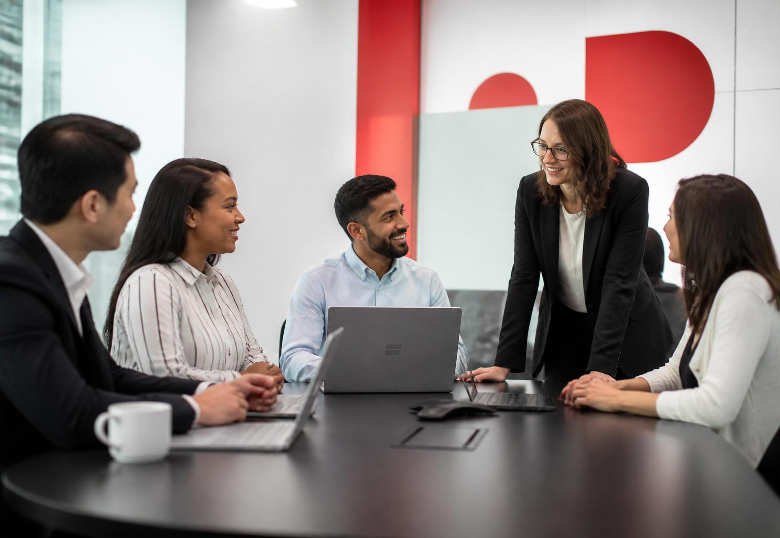 SuperBytes Info consulting team collaborating at the Dubai World Trade Centre office